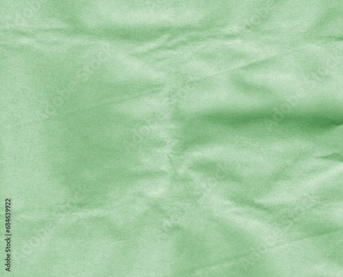 Crumpled green craft paper sheet