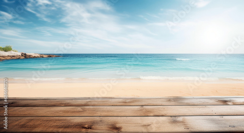 wooden surface in front with clean beach in background