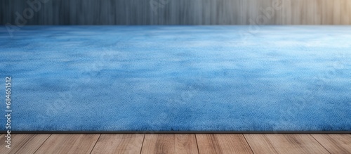Blue carpet on wooden floor...