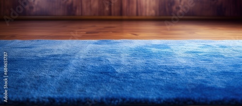 Blue carpet on wooden floor...