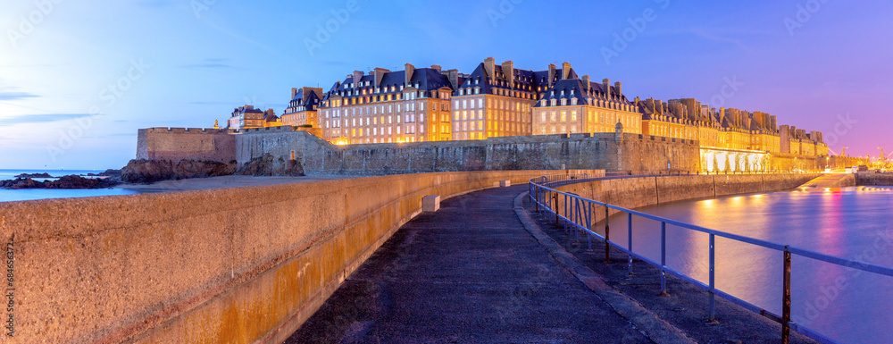 Panoramic view of Medieval walled city and fortress Saint-Malo at sunset, Brittany, France