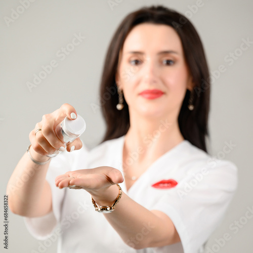 Photography The girl holds a skin care cream in her hands