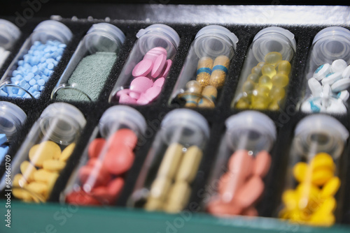 small jars of medicine pills tablets