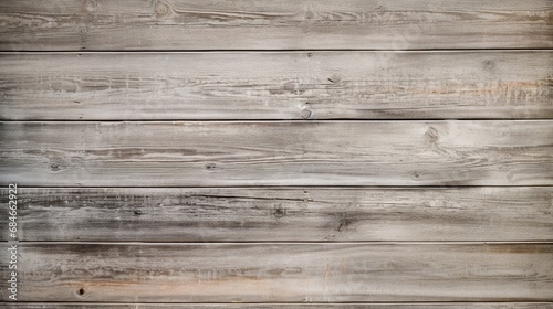 A wooden plank wall with a weathered gray finish, evoking a sense of coastal charm.
