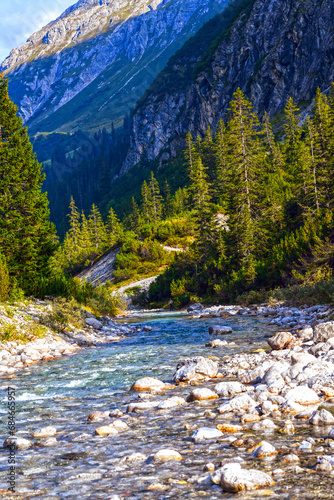 Der Lech - unberührte Wildflusslandschaft in Lech am Arlberg (Vorarlberg, Österreich) photo