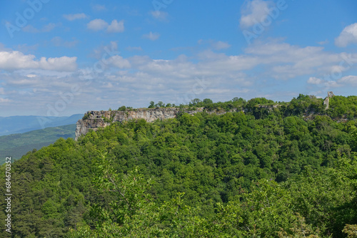 Mangup-Kale cave city, sunny day. Mountain view from the ancient cave town of Mangup-Kale in the Republic of Crimea, Russia. Bakhchisarai.