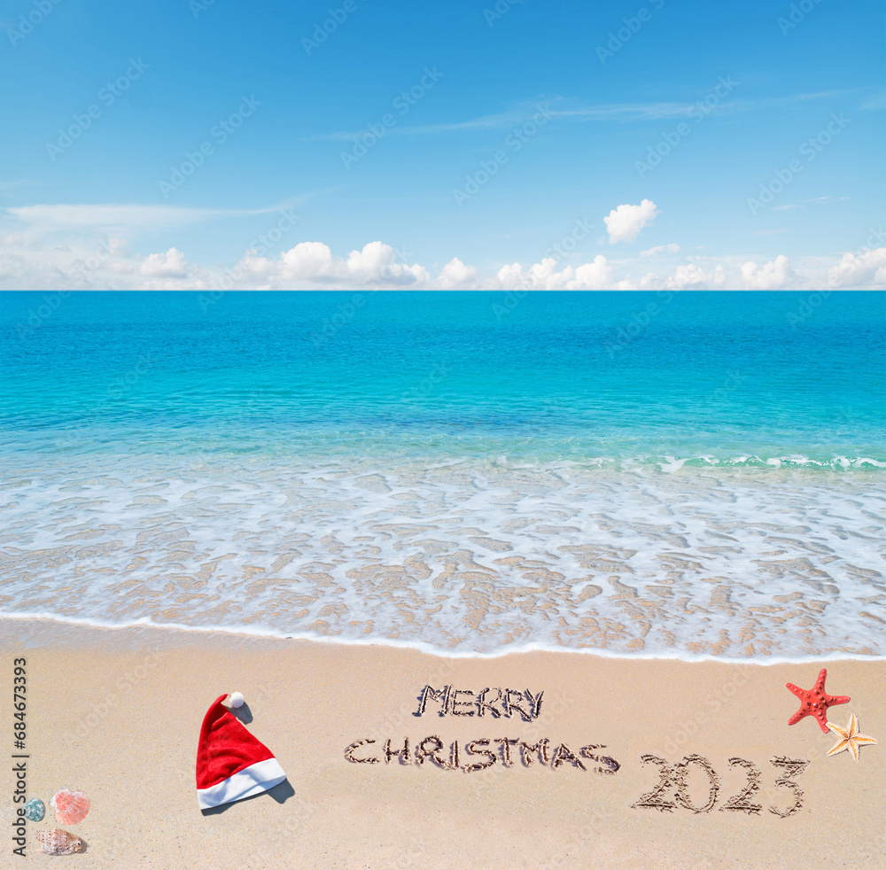 Fototapeta premium merry Christmas 2023 under a blue sky