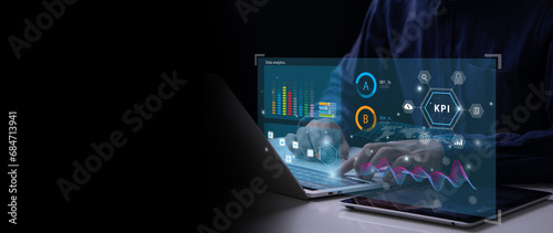 Analyst working with computer in Business Analytics and Data Management System with KPI and metrics connected to the database for technology finance, operations, sales, marketing. Data analysis.Ai photo
