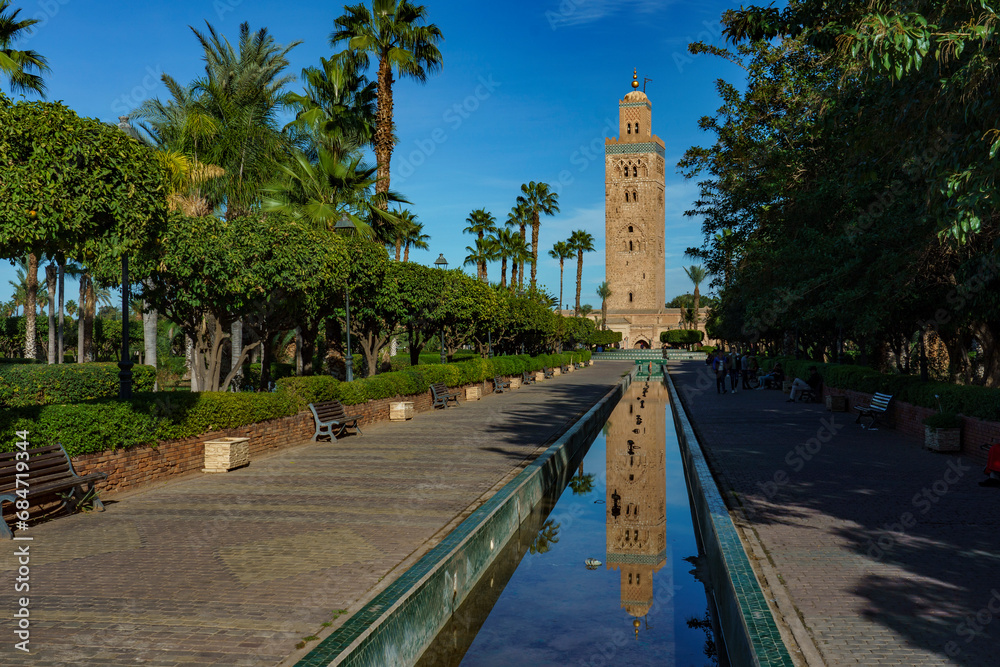 Fototapeta premium Morocco. Marrakesh. The minaret of the Koutoubia mosque with gardens and canals.