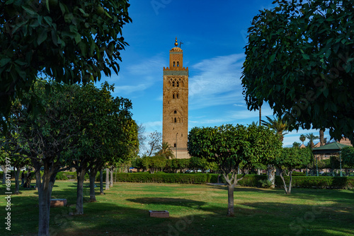 Morocco. Marrakesh. The minaret of the Koutoubia mosque with gardens photo