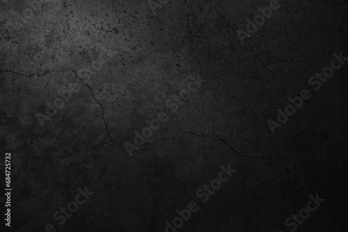 Old black concrete wall texture. Grunge background