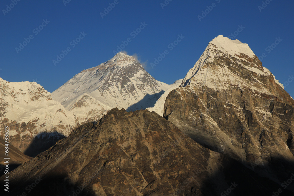 Mt Everest lit by golden evening light, Nepal.