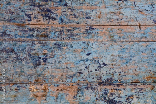 Vintage wood background peeling paint. Distressed backdrop.
