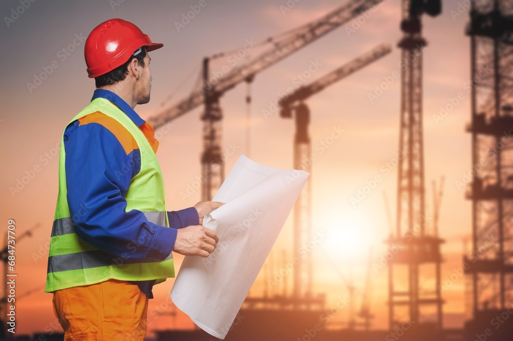 A team of engineers and architects inspect construction site A team of engineers and architects inspect construction site