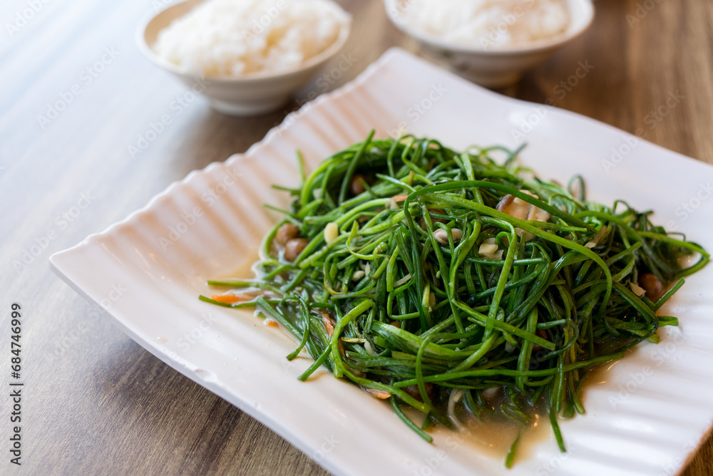 Stir fried white water snowflake stems with Cordia dichotoma Stir fried white water snowflake stems with Cordia dichotoma