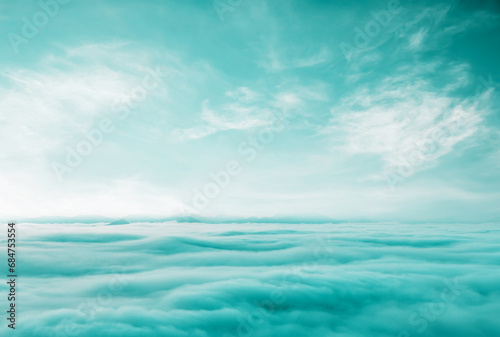 Blue sky with some clouds. View over the clouds.ummer blue sky cloud gradient light white background. Beauty clear cloudy in sunshine calm bright winter air bacground. Gloomy vivid cyan landscape 