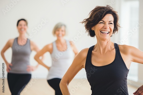 Zumba unites middle-aged friends in a lively dance class. Candid joy and energetic moves showcase their commitment to an active, vibrant lifestyle together