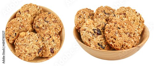 Granola cookie in wooden bowl isolated on white background with full depth of field. Top view. Flat lay.