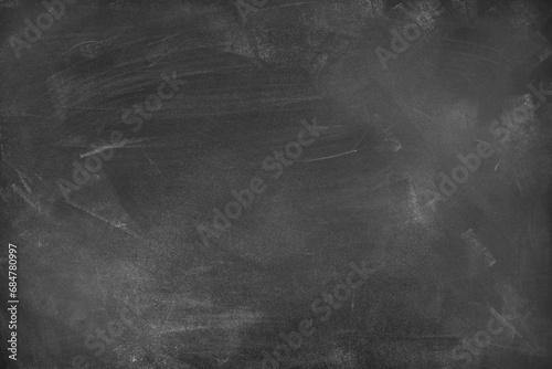 Chalk rubbed out on blackboard background photo
