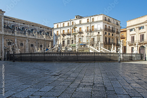 In the heart of Palermo's loveliest square, Piazza Pretoria, stands this magnificent fountain, Fontana Pretoria, work of the Florentine sculptor Francesco Camilliani. Palermo, Sicily, Italy. photo