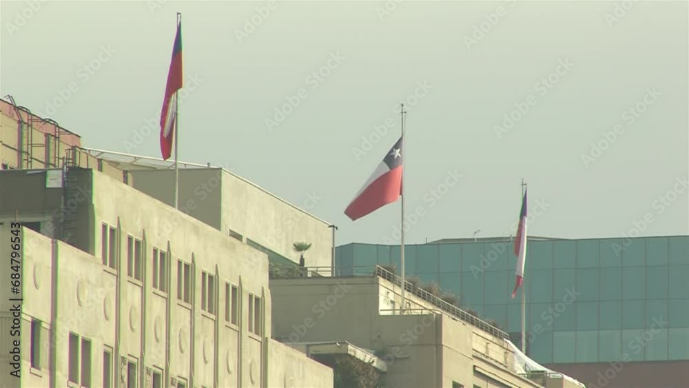 Flags of Chile on the Roof of a Building near La Moneda Palace in Santiago, Chile. 