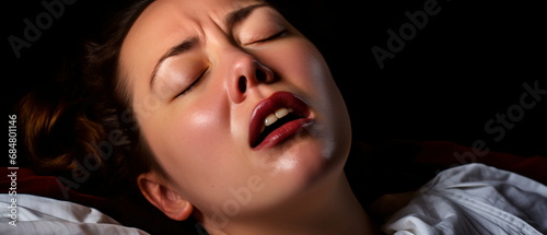 Top view of a beautiful sensual woman getting sexual pleasure, erotica and orgasm. Sensual sexy caucasian woman with open mouth and closed eyes enjoying lying in bed for sex. Generative ai photo