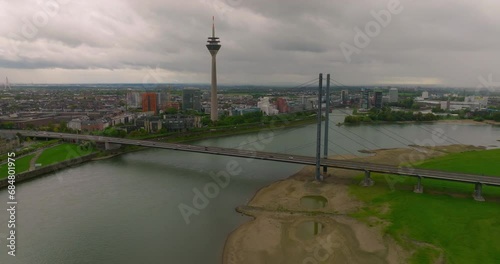 Dusseldorf: Aerial view of city in Germany, skyline with bridge over river Rhine - landscape panorama of Europe from above photo