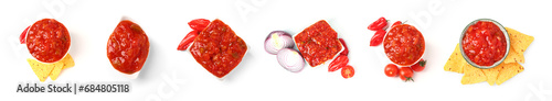 Set of delicious salsa sauce on white background, top view photo