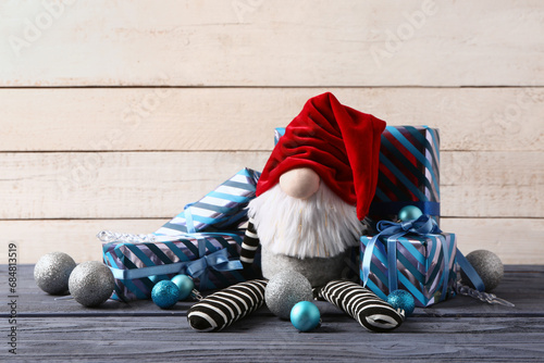 Christmas gnome with gift b...