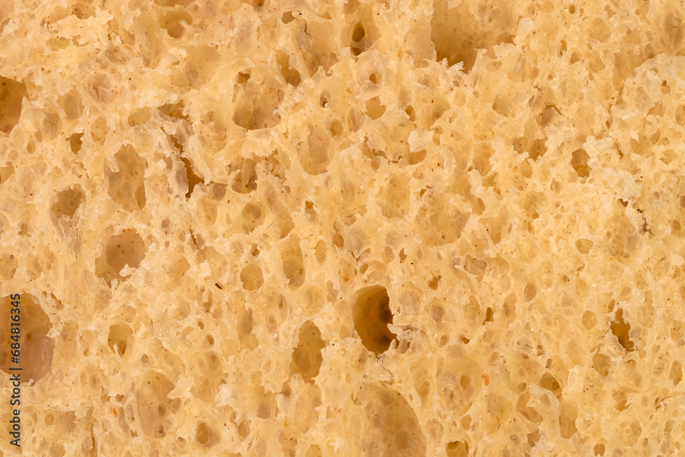 Fresh wheat bread close-up. Inside freshly baked delicious bread