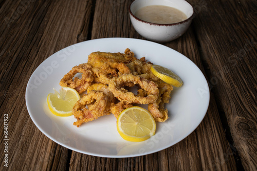 fried calamari and lemon slices