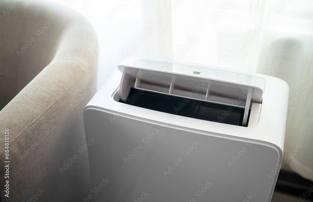 Fotografie Modern floor standing mobile air conditioner.
