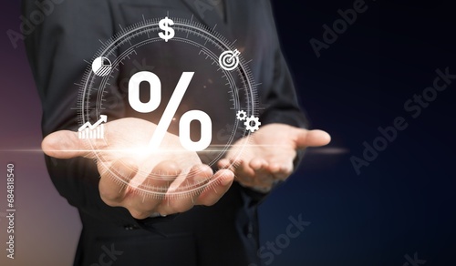 interest rates, investment returns concept, percentage symbol in hand