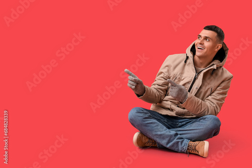 Young man in stylish puffer...