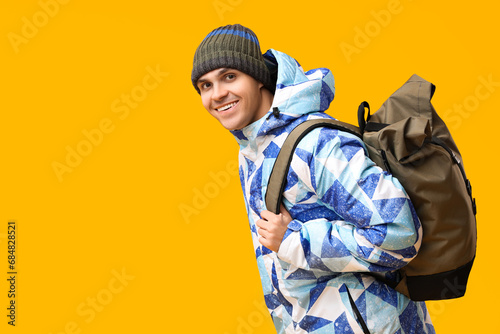 Young man in stylish puffer...