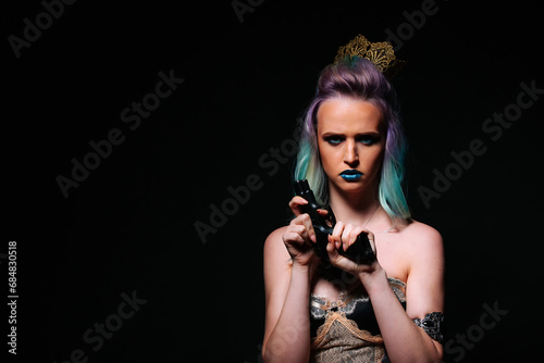 A woman with blue hair holding a gun. A Mysterious Femme Fatale with Electric Blue Hair, Gripping a Deadly Weapon photo