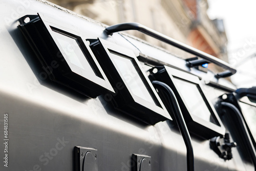 Heavy armored police vehicle military truck with heavy armor and small windows closeup detail. Prisoner, money transport, goods protection, secure high risk transportation abstract concept, nobody photo