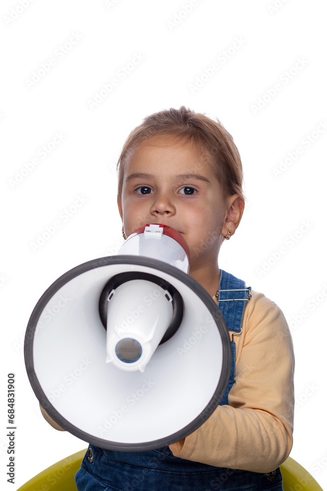 A small child, a 6-7-year-old girl, dressed in a denim dress, holding a megaphone in her hand, shouting announces a discount sale, hurry up