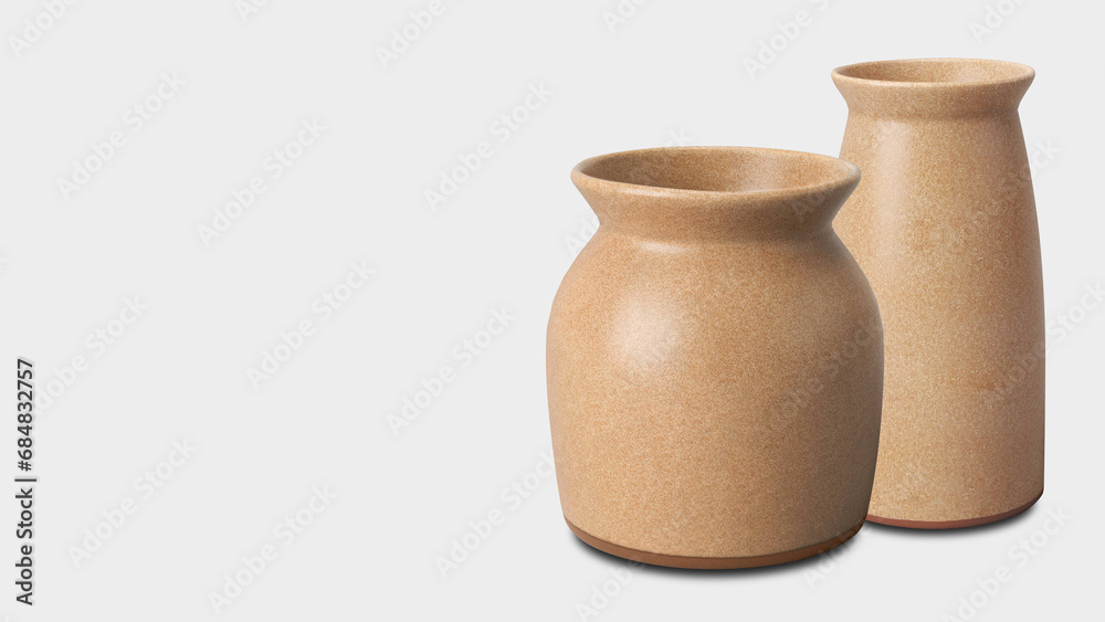 Closeup of earthenware ceramic jars, isolated on grey copy-space background.