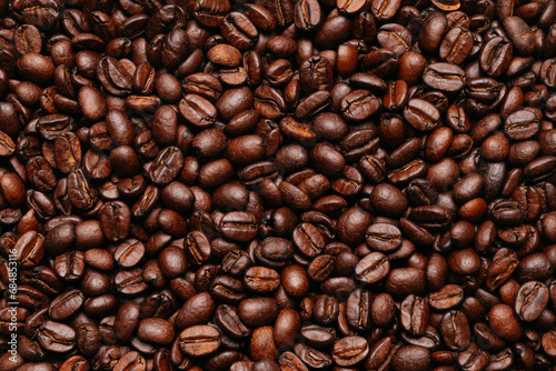 surface of roasted coffee beans seen from above