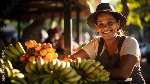 smiling latin woman at a fruit stand in a local market