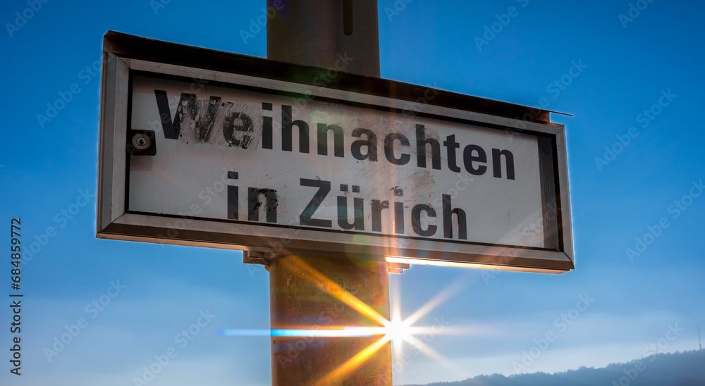 German Sign with sun star. English translation: Christmas in Zurich