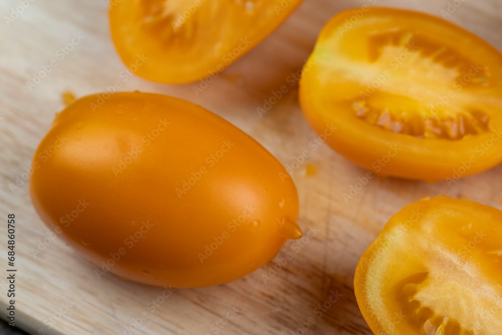 oval sweet yellow tomato, close up