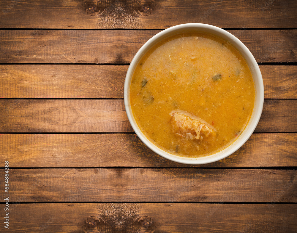 Dish served with fish consomme - Traditional Colombian food Dish served with fish consomme - Traditional Colombian food