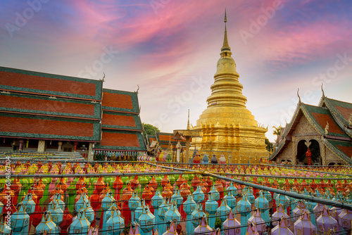 Colorful Lamp Festival and Lantern in Loi Krathong at Wat Phra That Hariphunchai, Lamphun Province Thailand photo