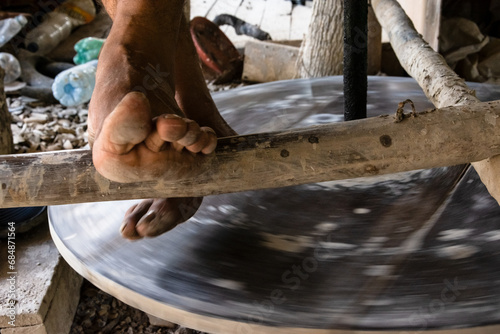 Artisan is working, manually, on the ceramic work in Maragogipinho in the city of Aratuipe, Bahia. photo