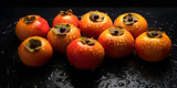 persimmon drops water, ripe persimmons, black background