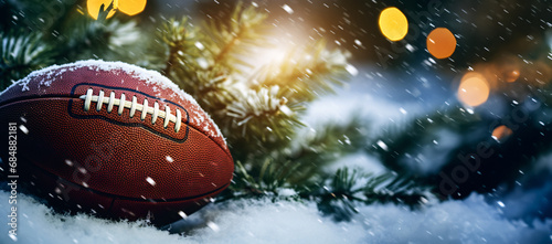 American football ball on the snow on a snowy day during the Christmas and New Year holidays photo