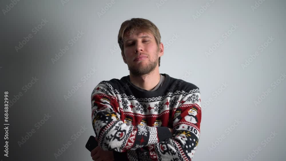young male guy wearing warm winter season seater and feeling cold young male guy wearing warm winter season seater and feeling cold