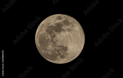 Super full moon in the night sky, closeup of photo.